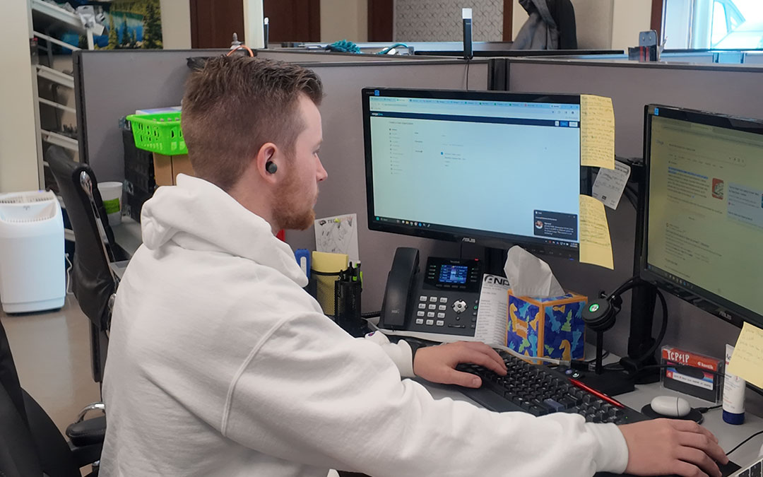 Team member at a desk.